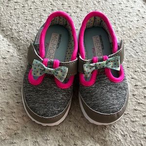 Skechers baby/walker shoes.  Like new, worn once in house.